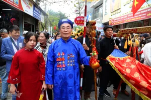 Tien Cong Festival 2024: Honoring the Elderly and Founding Ancestors of Ha Nam Island - image 1