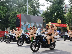 Spectacular Military Parade and Public March by Hanoi Police Force - image 13
