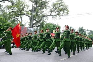 Spectacular Military Parade and Public March by Hanoi Police Force - image 0