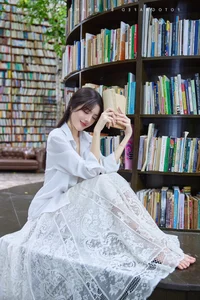 Lilly Luta Captivates Fans with Pure and Elegant White Shirt Photoshoot - image 4