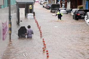 Documenting the Aftermath: Historic Floods and Record Rainfall Devastate South Korea - image 6