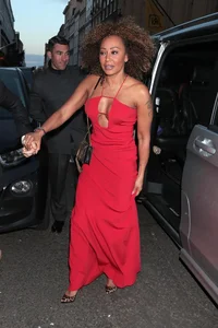 Victoria Beckham Celebrates Milestone 50th Birthday in Style Despite Glamorous Crutches and Sheer Elegance - image 0