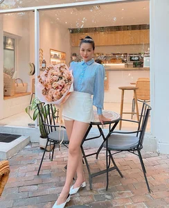 10 Chic Mini Skirt Outfit Ideas Inspired by Vietnamese Celebrities - image 6