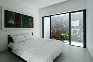 Khanh House: A Modern Hoi An Townhouse Blending Nature and Heritage - image 13