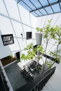 Khanh House: A Modern Hoi An Townhouse Blending Nature and Heritage - image 3