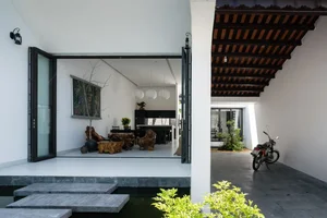 Khanh House: A Modern Hoi An Townhouse Blending Nature and Heritage - image 11