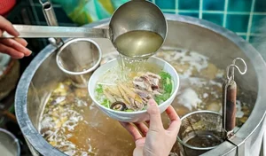 Famous 34-Year-Old Hanoi Chicken Pho Stall Sells Out Daily - image 3