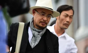 The Secrets Behind Coffee King Dang Le Nguyen Vu’s Iconic Scarf and Brand Aesthetics - image 6