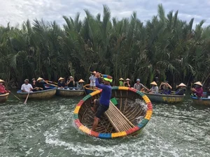 The Mesmerizing Basket Boat Dance of Bay Mau Coconut Forest in Hoi An - image 8