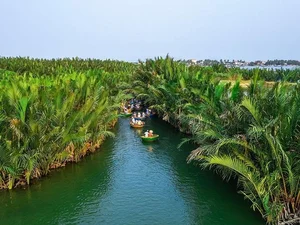 The Mesmerizing Basket Boat Dance of Bay Mau Coconut Forest in Hoi An - image 4