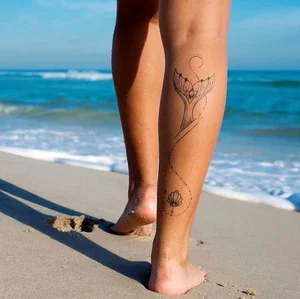 111+ Beautiful and Alluring Calf Tattoos for Women: Elegant Ink Inspiration - image 13