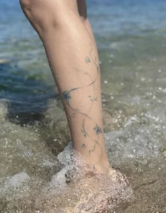 111+ Beautiful and Alluring Calf Tattoos for Women: Elegant Ink Inspiration - image 20