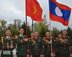 Vietnam People's Army Strengthens Ties with China and Laos through Cultural Exchange - image 14