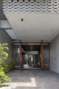 Modern 3-Story HY House in Da Nang with a Unique Perforated Terracotta 'Tropical Shell' - image 10