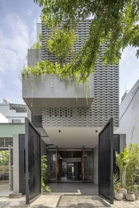 Modern 3-Story HY House in Da Nang with a Unique Perforated Terracotta 'Tropical Shell' - image 0