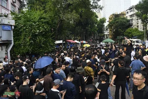 Thousands of Citizens Pay Solemn Respects to General Secretary Nguyen Phu Trong - image 8