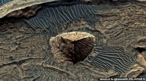 The Mars Mystery: Analyzing the Bizarre Three-Sided Pyramid Structure Discovered on the Red Planet - image 6