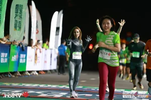 Spider-Woman Runner Steals the Show at Local Marathon - image 4