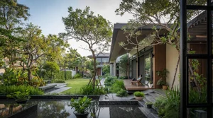 Modern Multi-Generational Home Design: Three Separate Blocks Around a Central Courtyard - image 11