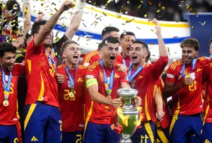 Victory Moment: Spanish Players Lift the Euro 2024 Championship Trophy - image 12
