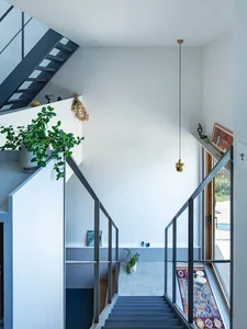 Innovative 27m2 Micro-House Design: Maximizing Sunlight and Airflow in Narrow Alleys - image 6