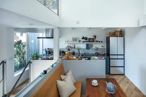 Innovative 27m2 Micro-House Design: Maximizing Sunlight and Airflow in Narrow Alleys - image 0