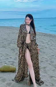 Thu Thuy Radiates in Vibrant Orange: Summer Fashion Inspiration by the Sea - image 6