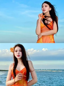 Thu Thuy Radiates in Vibrant Orange: Summer Fashion Inspiration by the Sea - image 2
