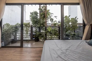 Tour a Stunning 25m2 Green Alley House in Vietnam - image 0