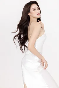 Bold Fashion Choices: Miss Vietnam Do Thi Ha Stuns in Braless Vest and Embraces Tycoon Ambitions - image 2