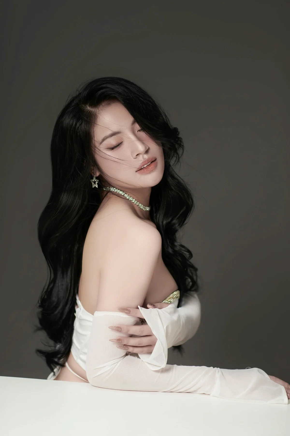 Tran Thi Duyen Flaunts Stunning Figure in Bold Cut-Out Dress