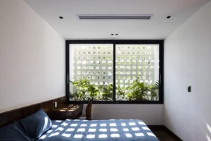 Innovative Architecture: Modern Saigon Home Showcasing Stunning Ventilation Brick Design - image 4