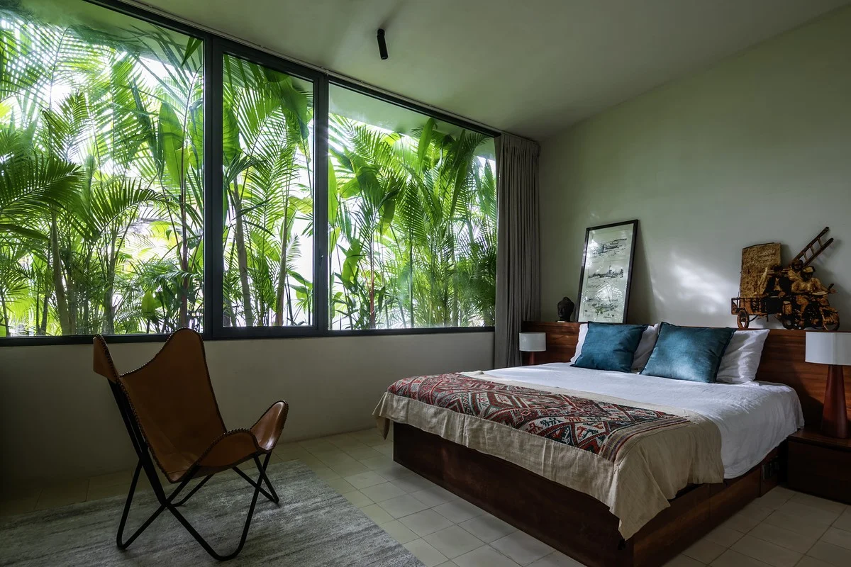 Urban Greenery: A 4-Story Townhouse Designed as a Lush Tropical Oasis