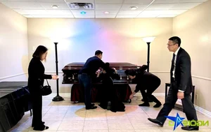 Emotional Moments as Family Supports Kasim Hoang Vu’s Mother at Funeral - image 0