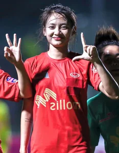 Rising Young Female Football Star Captivates Fans with Talent and Charm - image 3