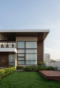 Modern 2-Story House Design Featuring Central Courtyard and Raw Concrete - image 8