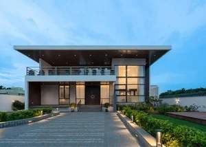 Modern 2-Story House Design Featuring Central Courtyard and Raw Concrete - image 14