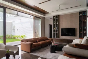 Modern 2-Story House Design Featuring Central Courtyard and Raw Concrete - image 4