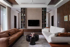 Modern 2-Story House Design Featuring Central Courtyard and Raw Concrete - image 1