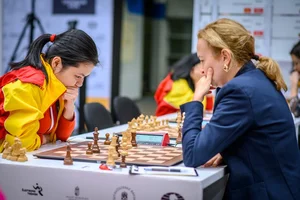 Thao Nguyen Defeats Former World Champion Boosting Vietnam's Chess Medal Hopes - image 0