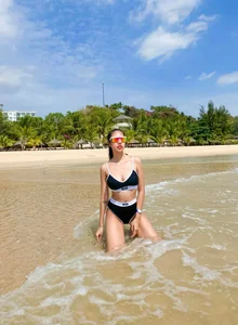 Celebrity Style: Quang Minh’s Wife Stuns in High-Cut Bikini Fashion - image 3