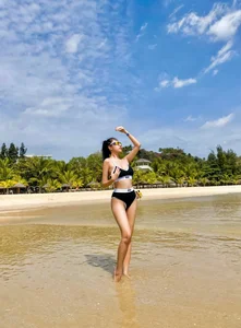 Celebrity Style: Quang Minh’s Wife Stuns in High-Cut Bikini Fashion - image 4