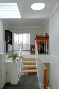 Optimizing Light and Space: A 65m2 Split-Level House Design in a Narrow Urban Alley - image 7