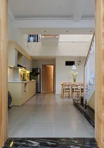Optimizing Light and Space: A 65m2 Split-Level House Design in a Narrow Urban Alley - image 5